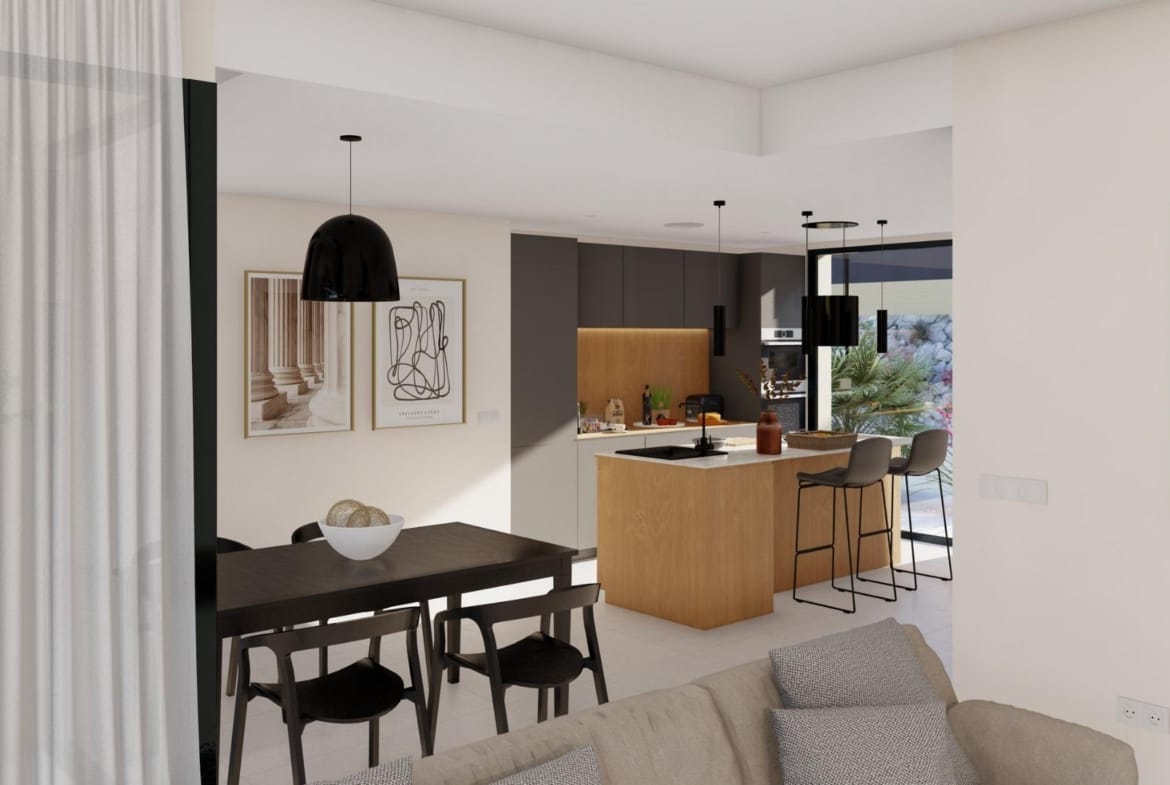 Modern open-plan kitchen and dining area in elegant new build villa at Altaona Golf Resort, Murcia.