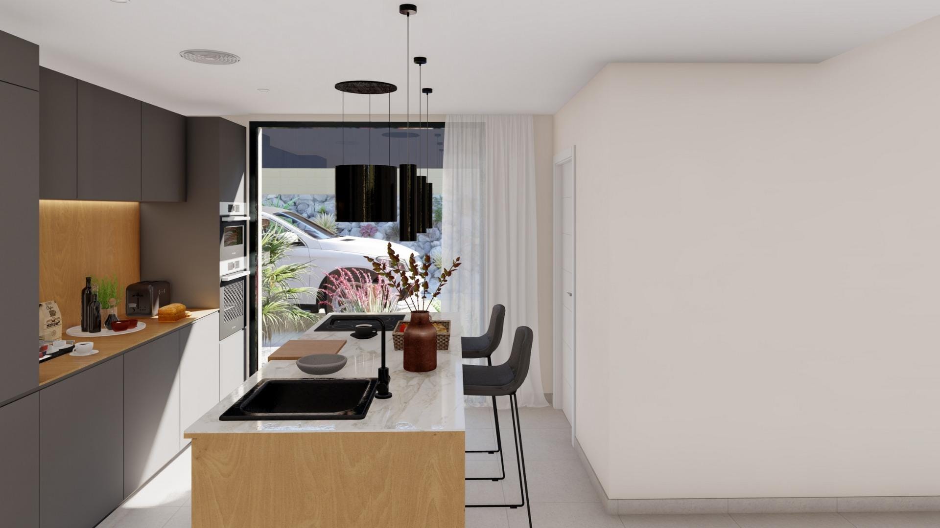 Modern kitchen with island and dining area in elegant new build villa at Altaona Golf Resort, Murcia.