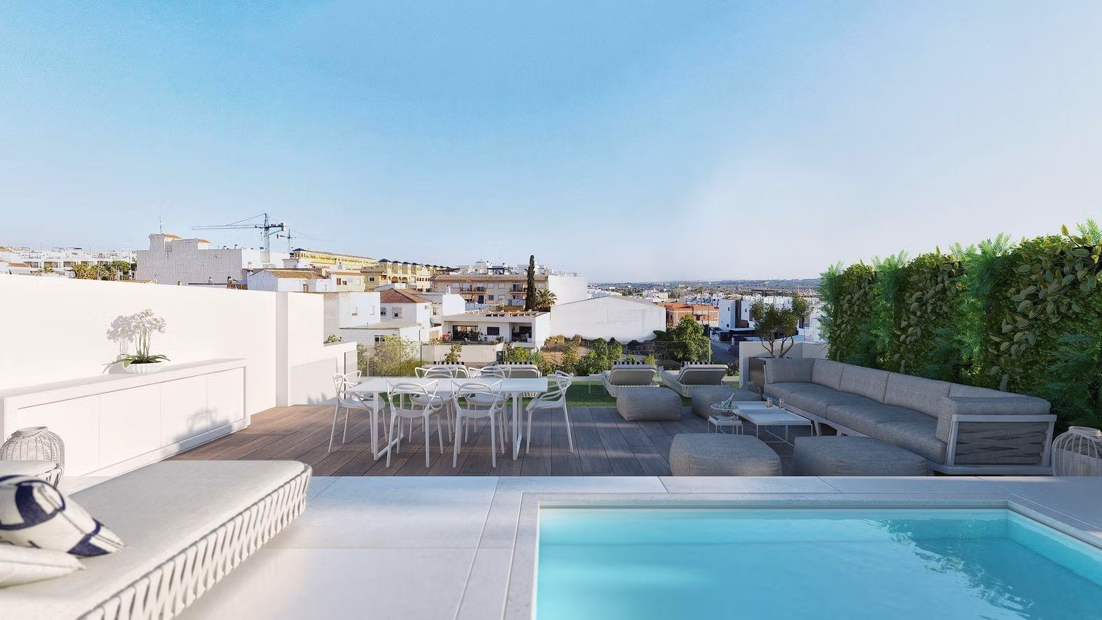 Rooftop terrace with pool, outdoor seating, and views of Benijofar in a modern new build 3 bedroom apartment.