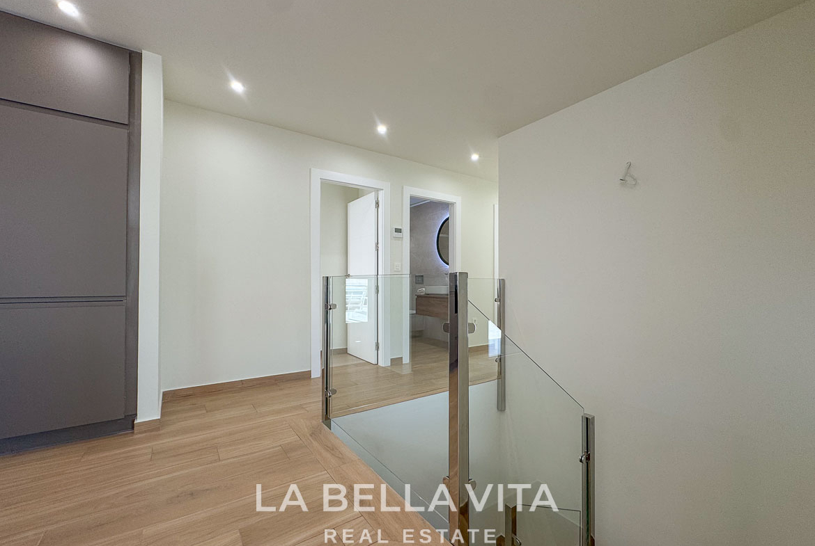Minimalist bright hallway with modern staircase in elegant single-storey new build villa in Benijófar, Costa Blanca