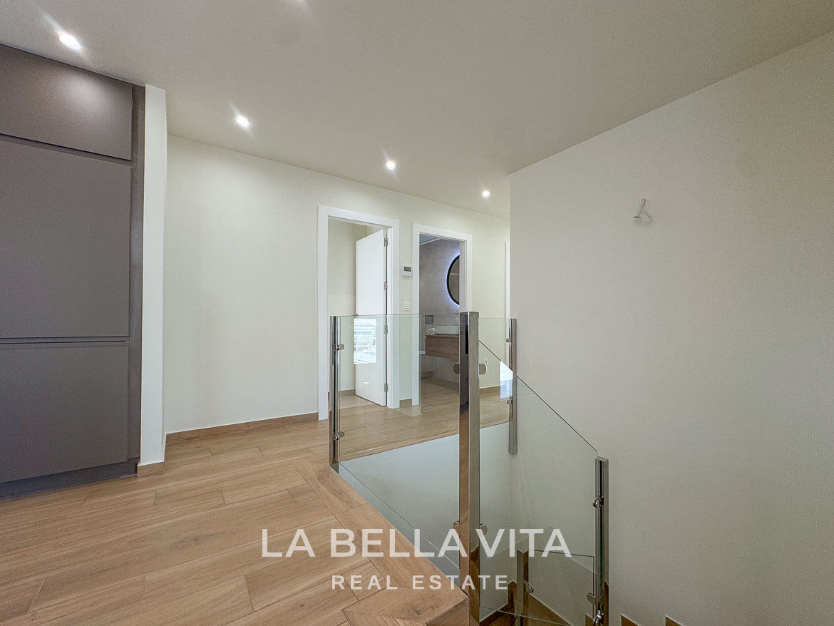Minimalist bright hallway with modern staircase in elegant single-storey new build villa in Benijófar, Costa Blanca