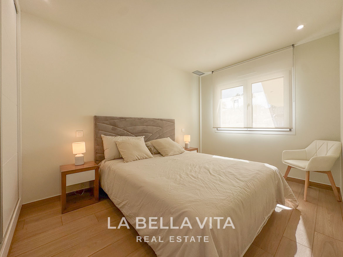 Bright and elegant bedroom with minimalist décor in luxury single-storey villa in Benijófar, Costa Blanca.