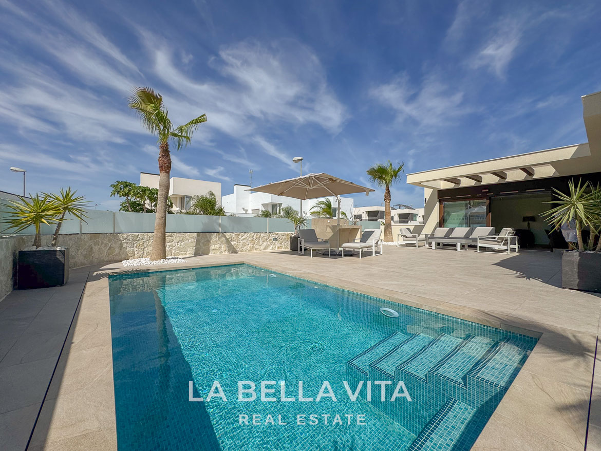 Sun-drenched private pool and sleek terrace of an elegant single-storey new build villa in Benijófar, Costa Blanca