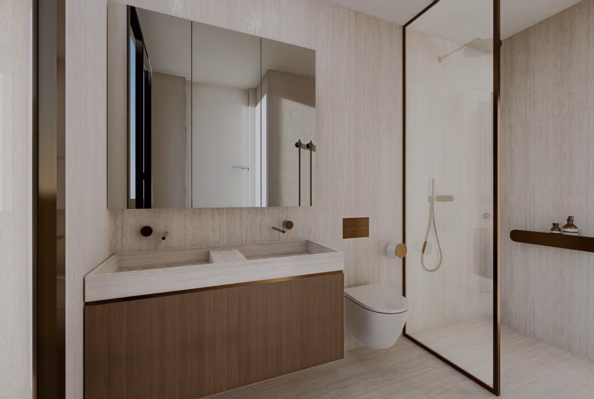 Modern bathroom with large mirror, wooden vanity, and glass-enclosed shower in luxury villa at Las Colinas Golf Resort.