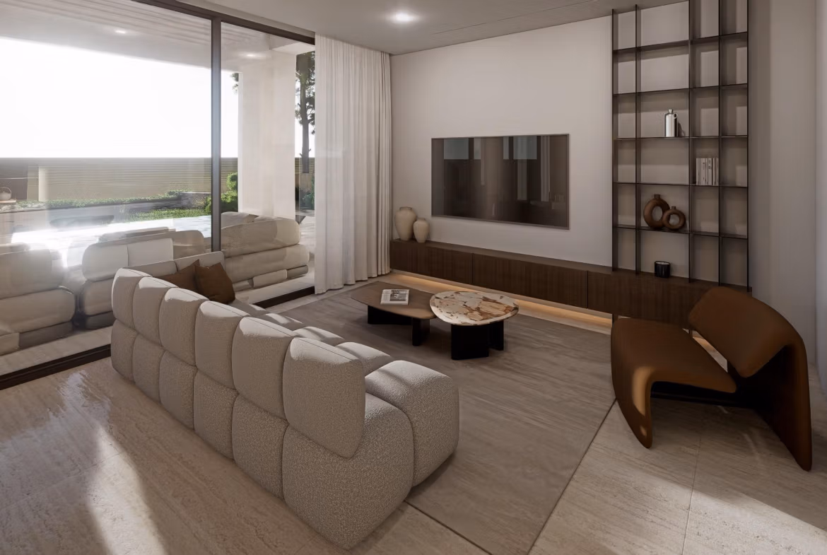 Modern living room with large windows overlooking the private pool in a luxury villa at Las Colinas Golf Resort