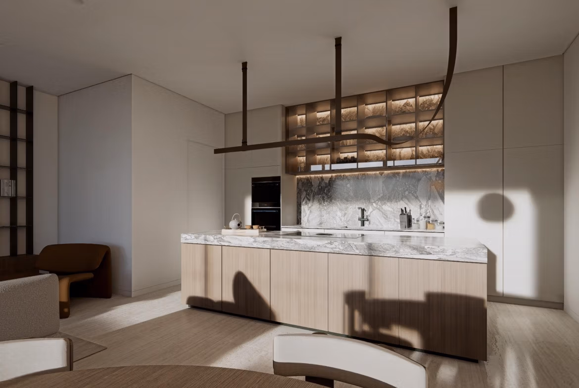 Modern kitchen with marble countertops and built-in appliances in luxury villa at Las Colinas Golf Resort