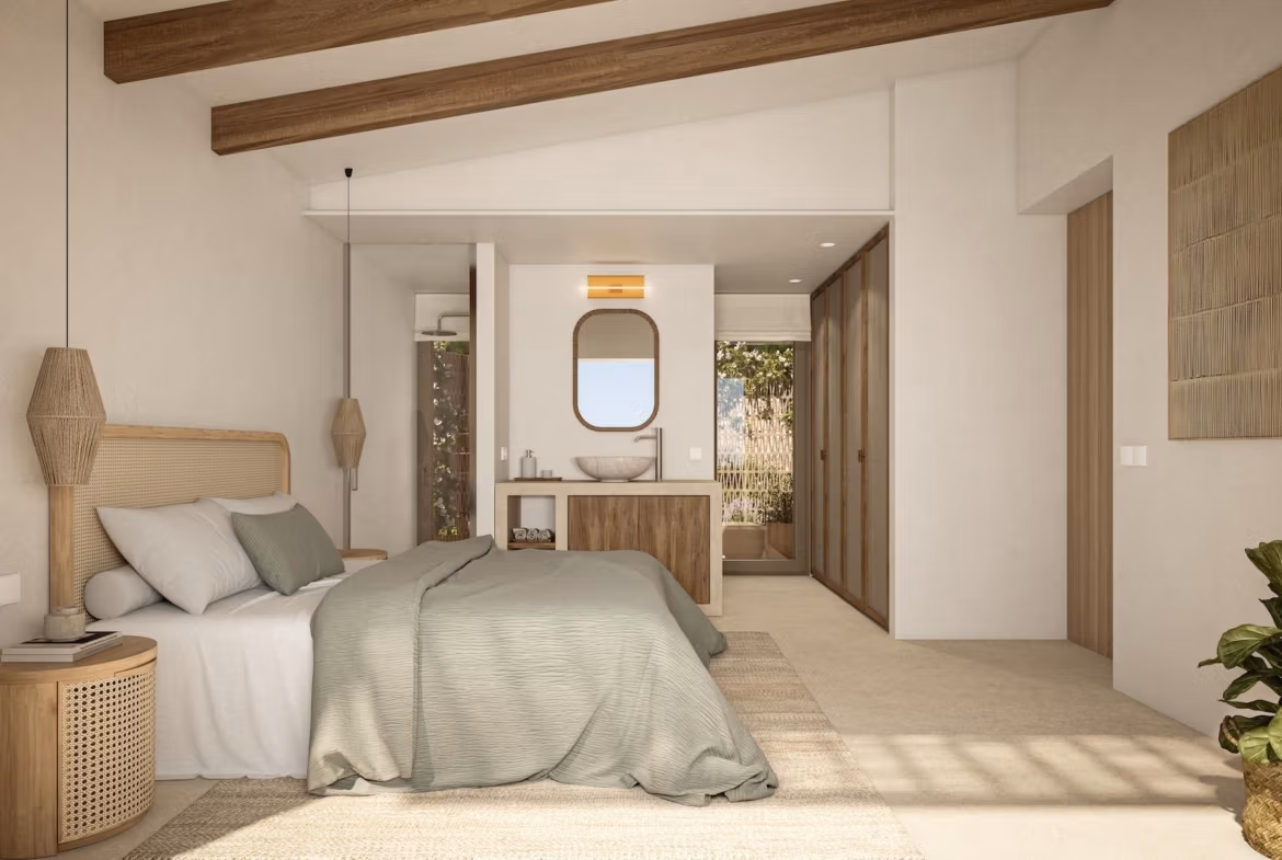 Bright and elegant bedroom with natural wood accents in a refined new single-storey villa in La Fustera, Benissa