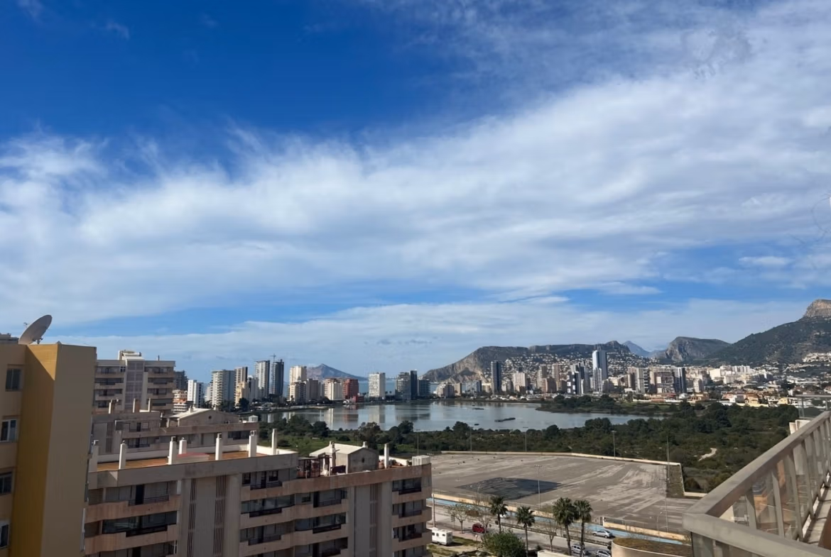 Panoramic sea and city views from the spacious sunlit terrace of a luxury 3-bedroom penthouse in Calpe