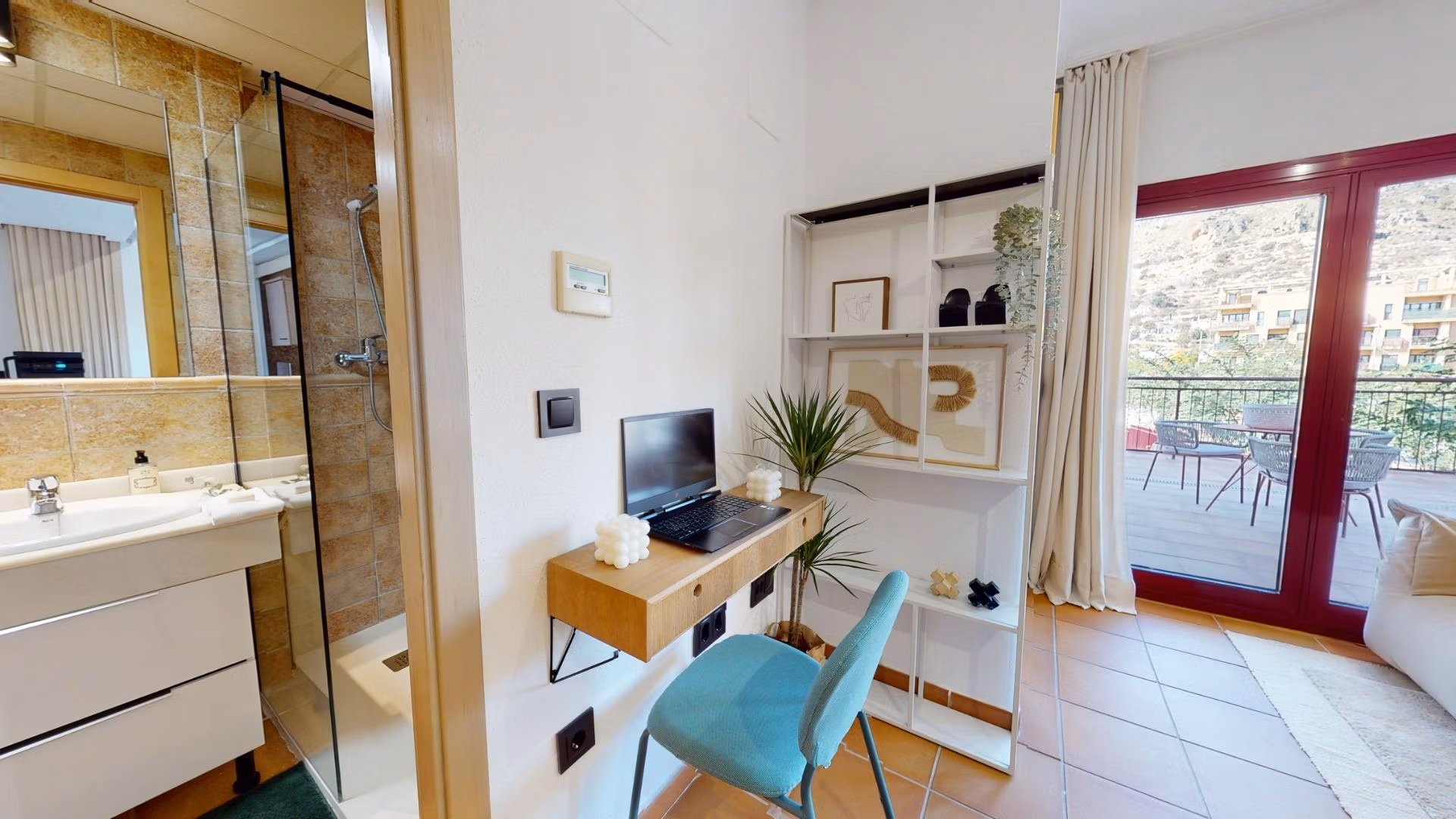 Bright, modern 1-bedroom apartment with stylish workspace, sleek bathroom, and spacious terrace in Villanueva del Rio Segura near Archena.