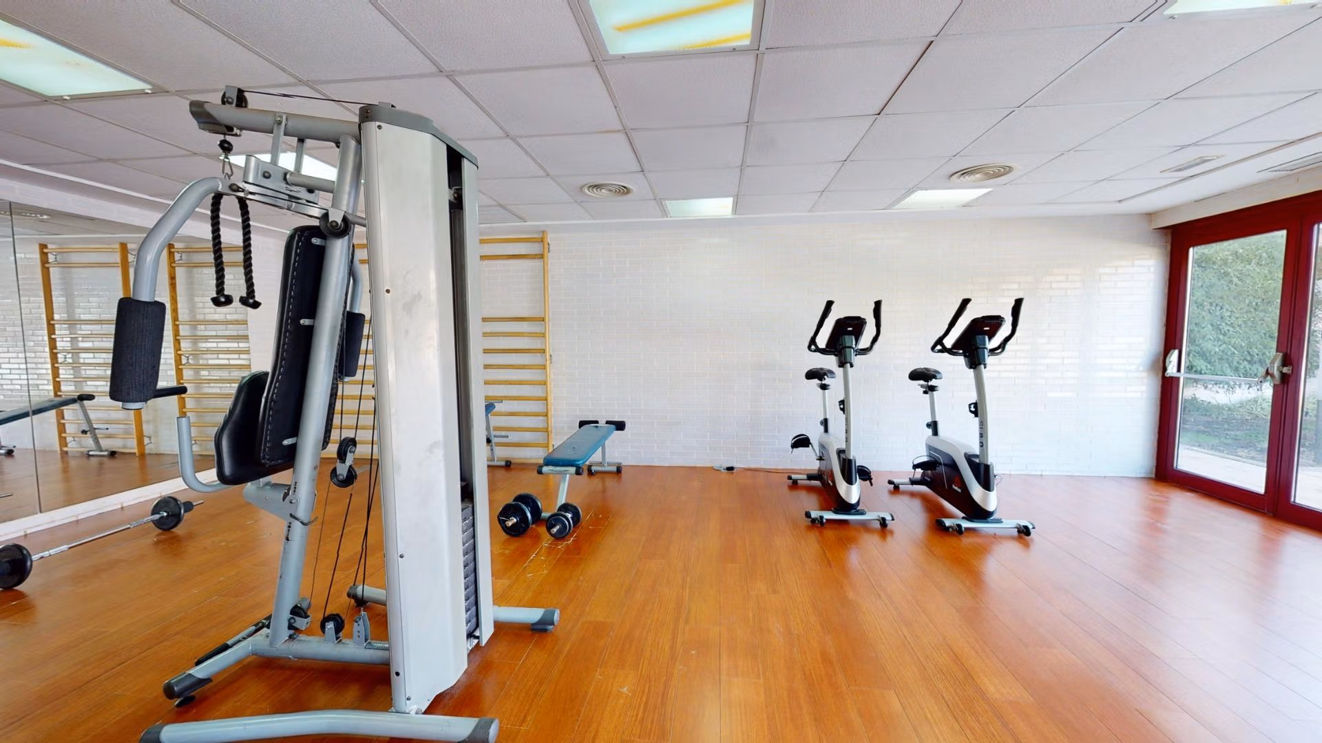 Bright, spacious private gym with modern equipment in luxury 2 bedroom penthouse near Archena, Murcia.