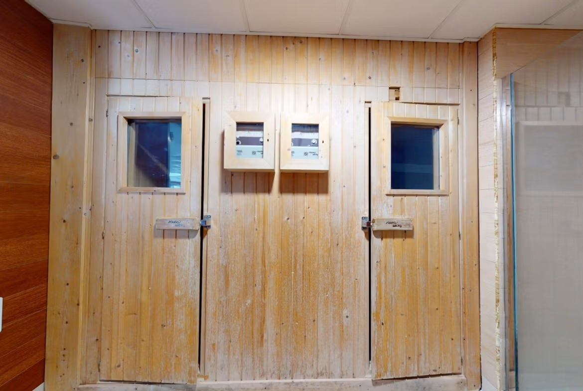 Private rustic wooden sauna room in luxurious 2-bedroom penthouse near Archena, Murcia, perfect for relaxation and wellness.