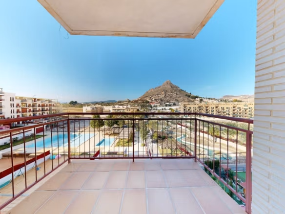 Bright terrace with panoramic pool and mountain views at charming 1-bedroom apartment in Villanueva del Rio Segura near Archena