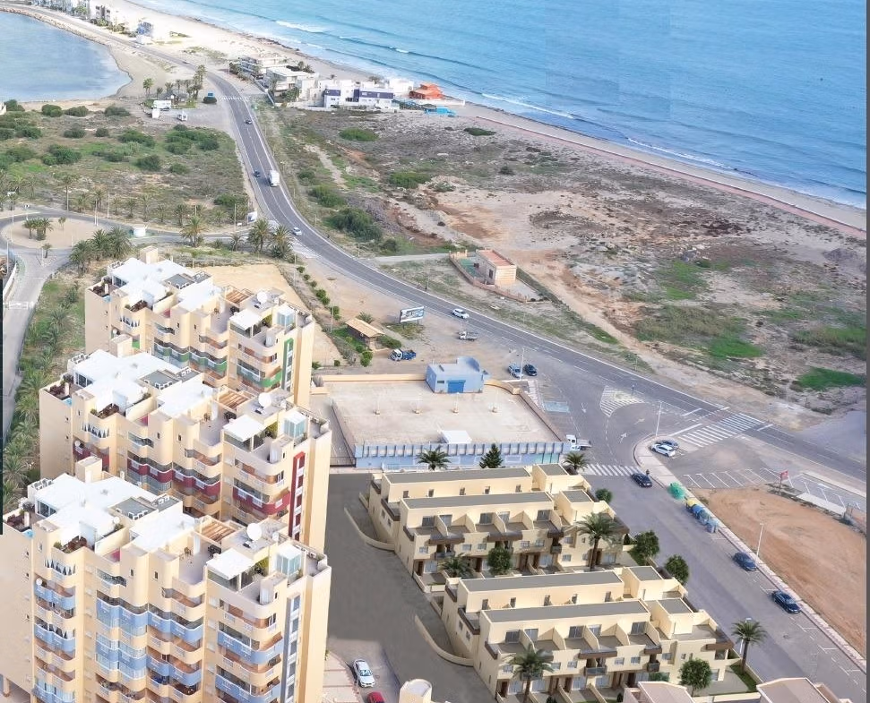 Modern 2 bedroom townhouse complex in La Manga del Mar Menor with bright terraces and panoramic sea views.