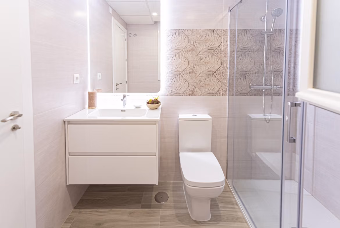 Modern, bright bathroom with sleek fixtures and glass shower in spacious 3-bedroom townhouse in La Manga del Mar Menor