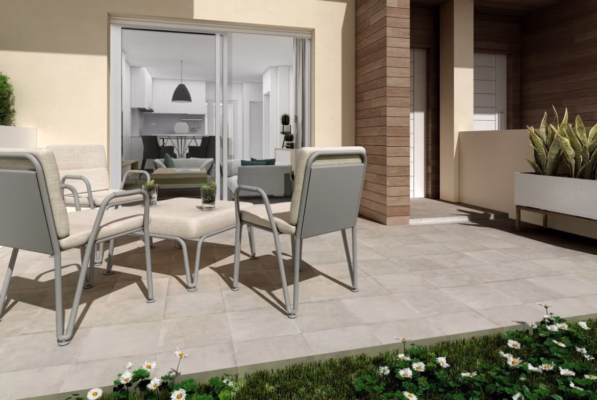 Modern spacious 3-bedroom townhouse terrace with elegant outdoor seating and lush garden in La Manga del Mar Menor new build.