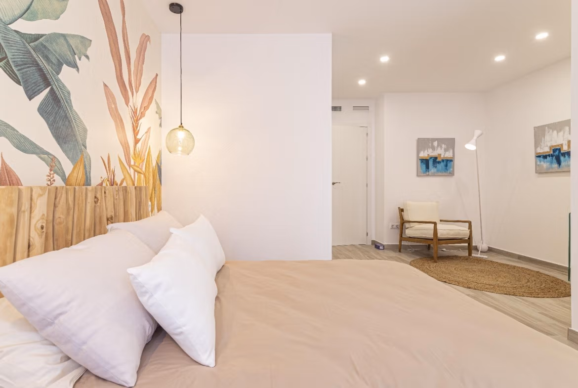Bright, modern 2-bedroom townhouse bedroom with elegant decor in La Manga del Mar Menor new build.