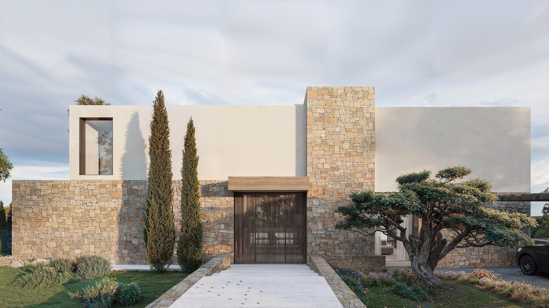 Modern architect-designed villa exterior in La Fustera, Benissa, featuring textured stone walls and minimalist landscaping.