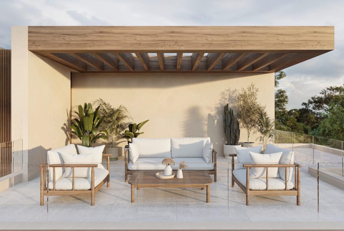 Spacious sun-drenched terrace with modern seating and lush plants at luxury 4-bedroom villa in La Fustera, Benissa