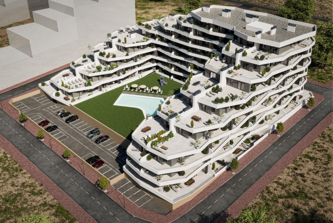 Modern luxury apartment complex in San Miguel de Salinas featuring spacious terraces, landscaped gardens, and a sparkling communal pool.