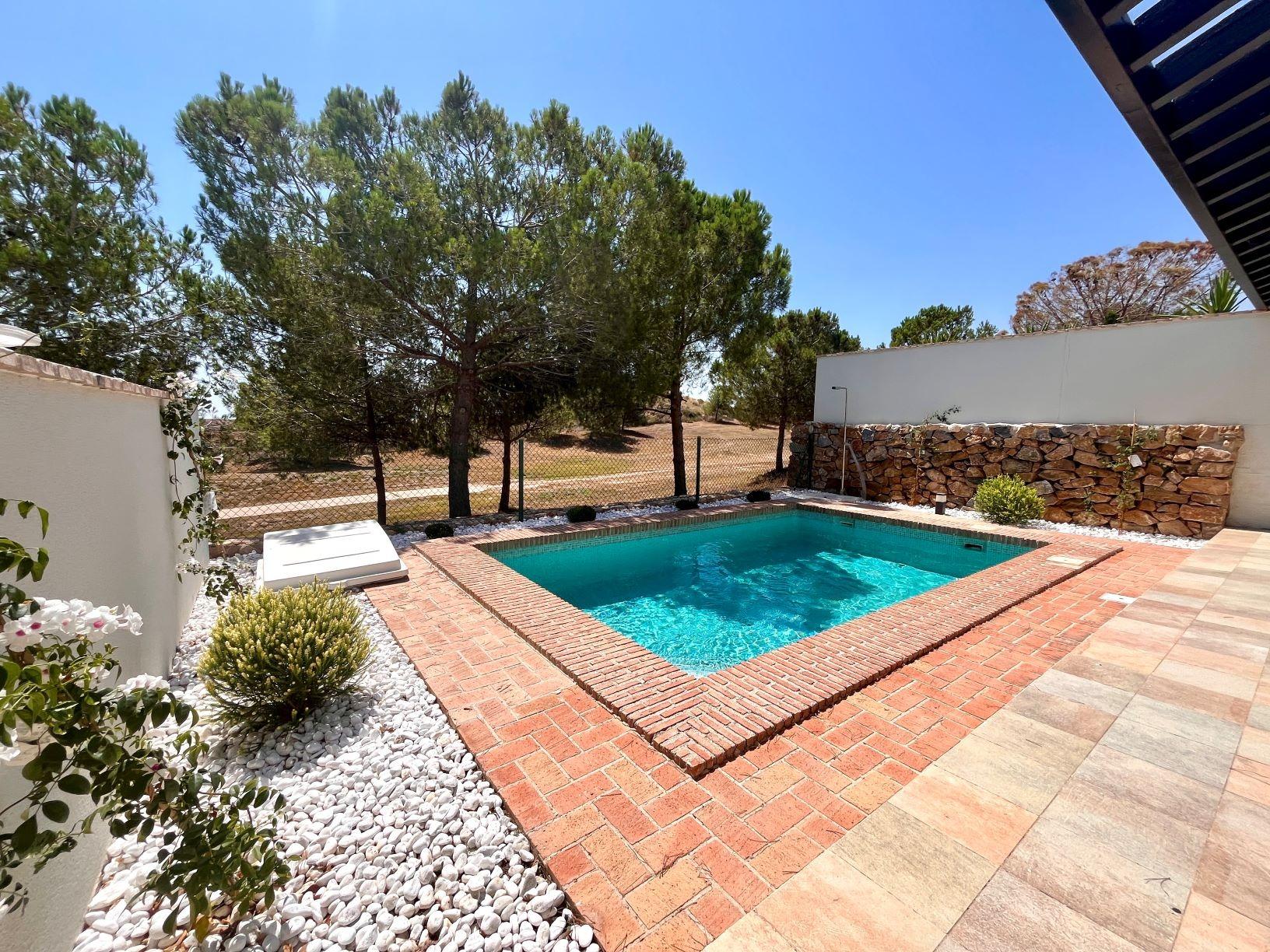 Elegant-One-Level-Townhouses-with-Private-Pool-in-Peraleja-Golf-Resort-–-Costa-Calida-12 Elegant Single-Storey Townhouse with Private Pool and Fireplace for Sale at Peraleja Golf Resort, Sucina