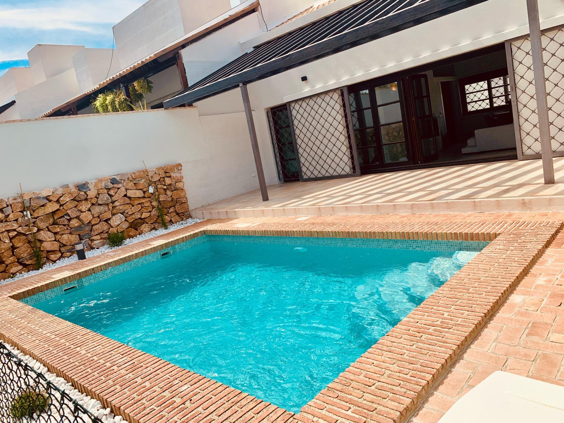 Elegant-One-Level-Townhouses-with-Private-Pool-in-Peraleja-Golf-Resort-–-Costa-Calida-13 Elegant Single-Storey Townhouse with Private Pool and Fireplace for Sale at Peraleja Golf Resort, Sucina