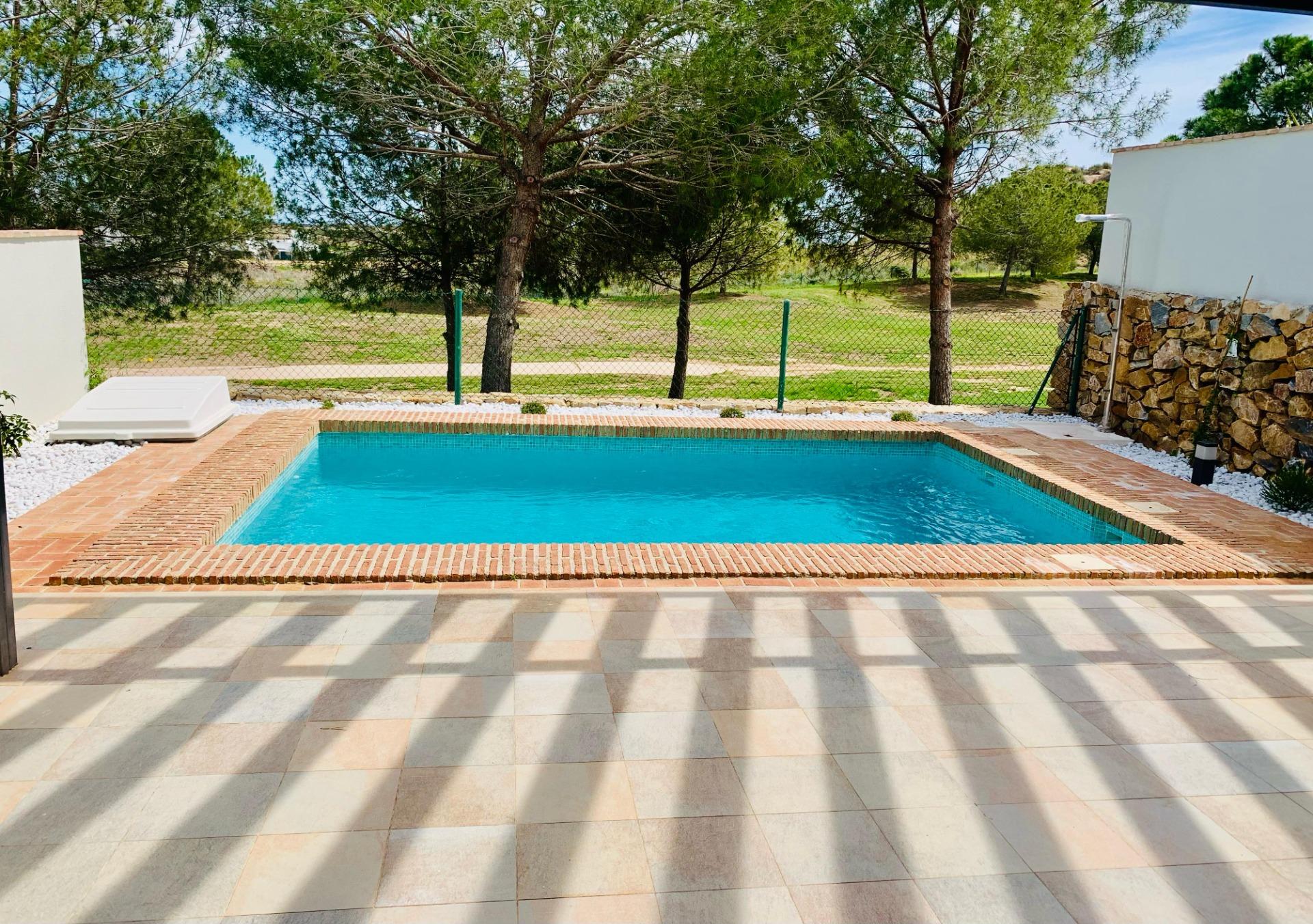 Elegant-One-Level-Townhouses-with-Private-Pool-in-Peraleja-Golf-Resort-–-Costa-Calida-14 Elegant Single-Storey Townhouse with Private Pool and Fireplace for Sale at Peraleja Golf Resort, Sucina