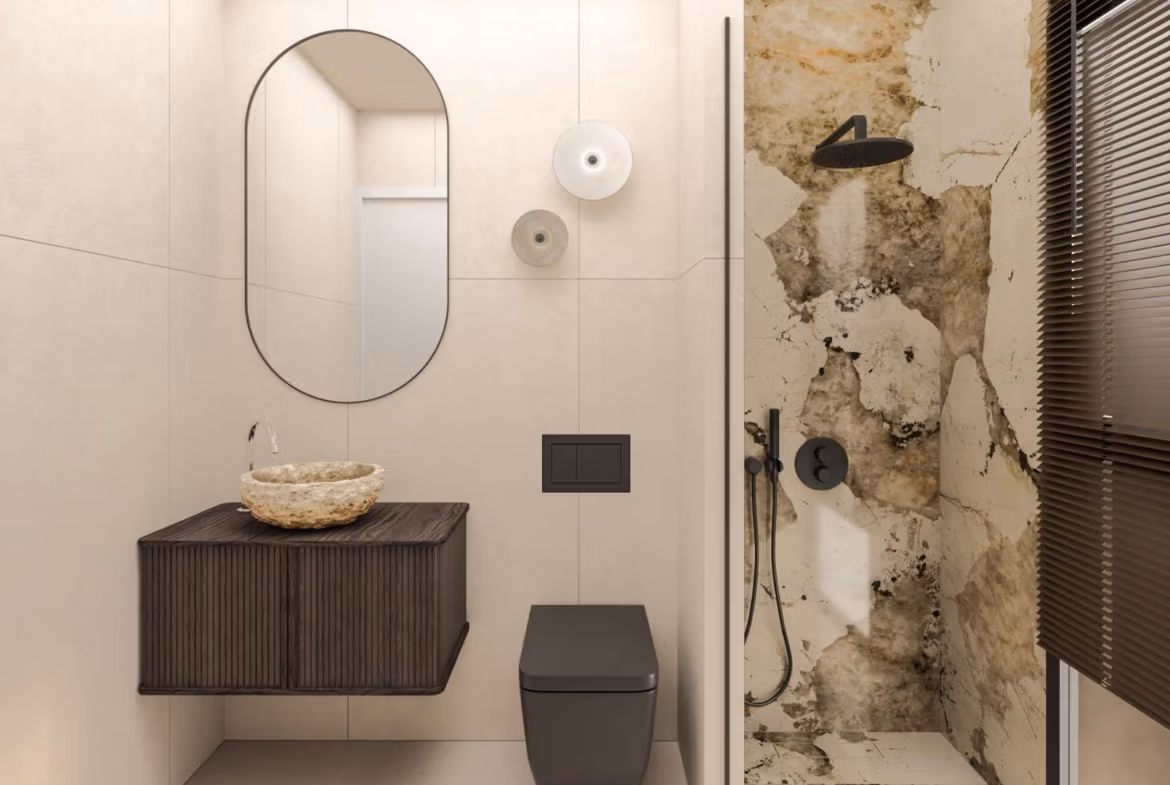 Modern luxury bathroom with sleek fixtures and textured stone shower in 3-bedroom villa, Cabo de Palos frontline new build.