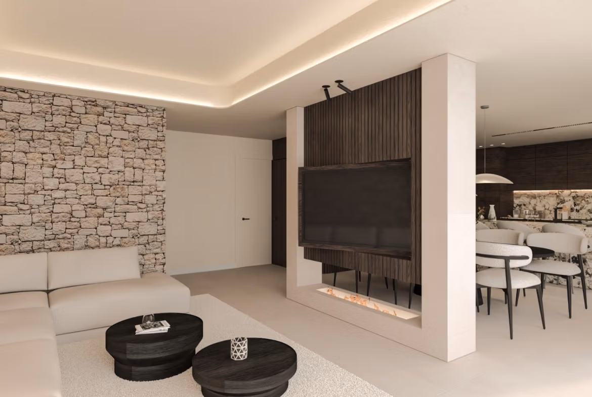 Bright and modern open-plan living area with stone accent wall in frontline 3-bedroom villa with sea views in Cabo de Palos