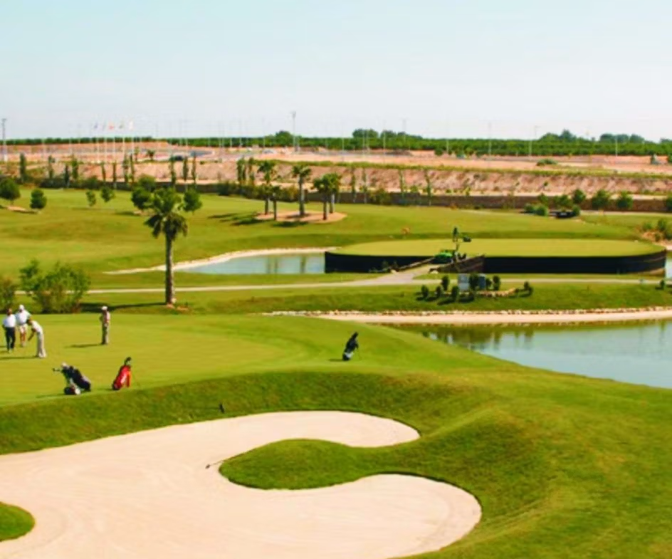 Sun-drenched landscaped golf course with water features near new build 3 bedroom ground floor apartment in Pilar de la Horadada