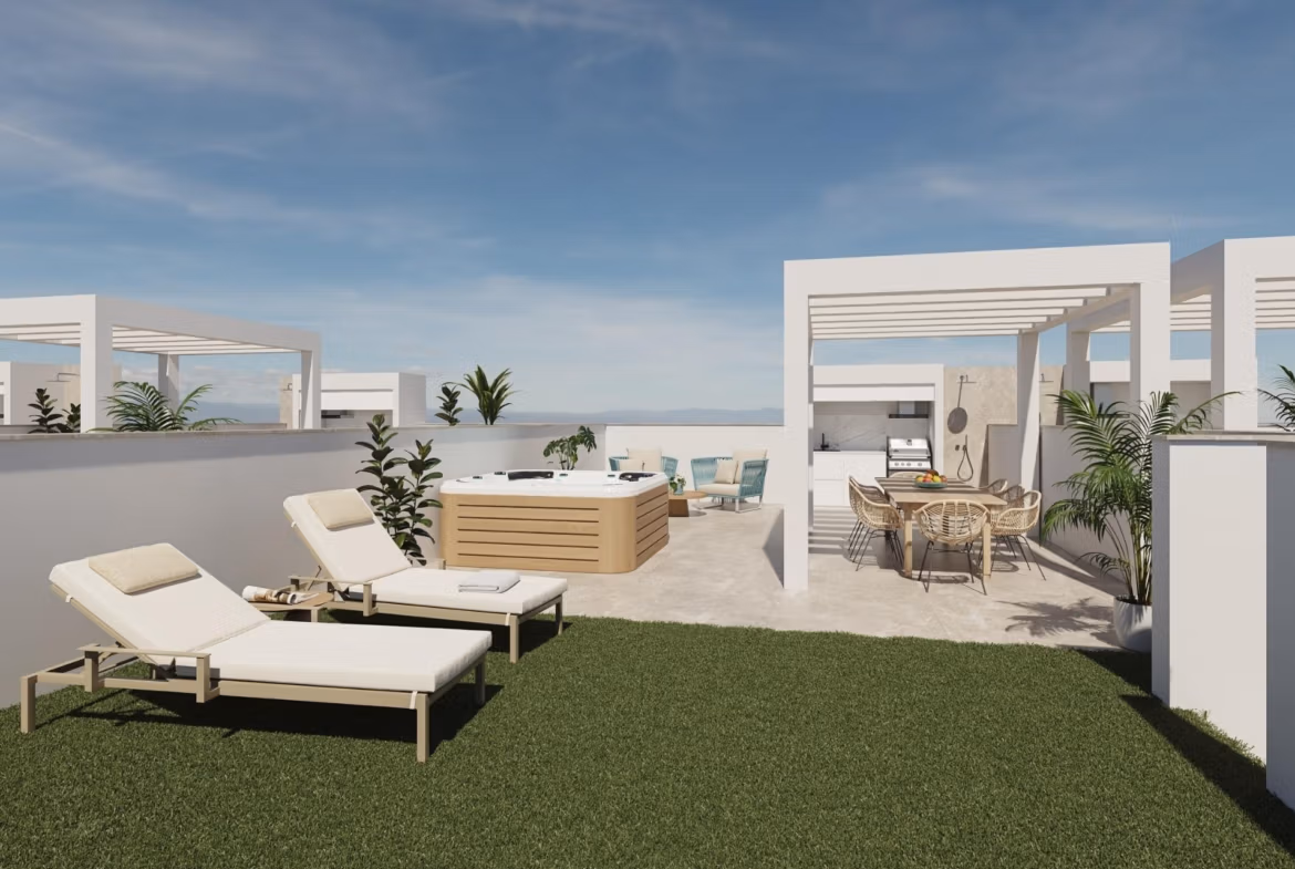 Spacious sun-drenched garden terrace with lounge chairs and dining area at new build 3-bedroom ground floor apartment in Pilar de la Horadada