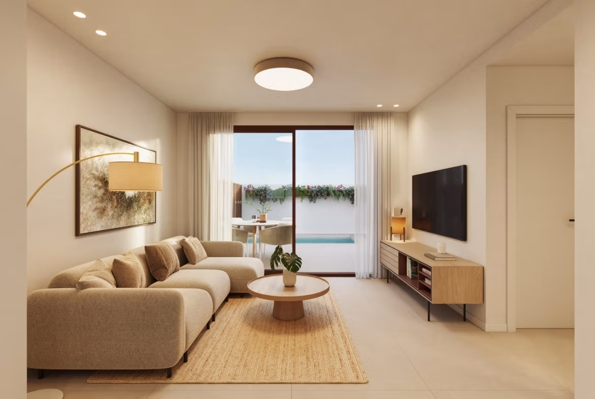 Bright and modern living room with plush sofa and pool view in exclusive new build bungalows, San Pedro del Pinatar.
