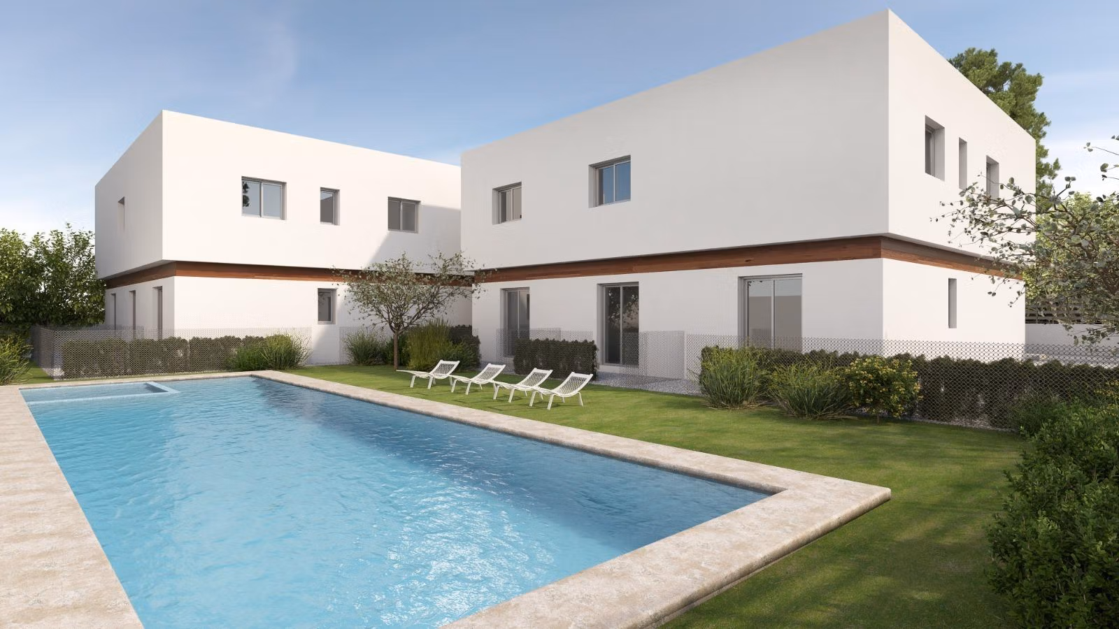 Modern 2-bedroom townhouse in Orihuela Costa with sleek white exterior, lush landscaping, and a sparkling communal pool under clear skies.