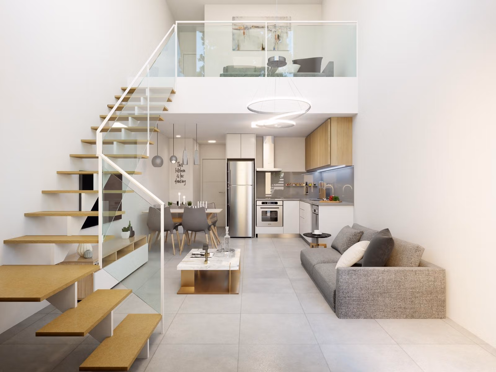 Bright modern interior of 2 bedroom townhouse in Orihuela Costa with open-plan kitchen, stylish living area, and floating staircase.