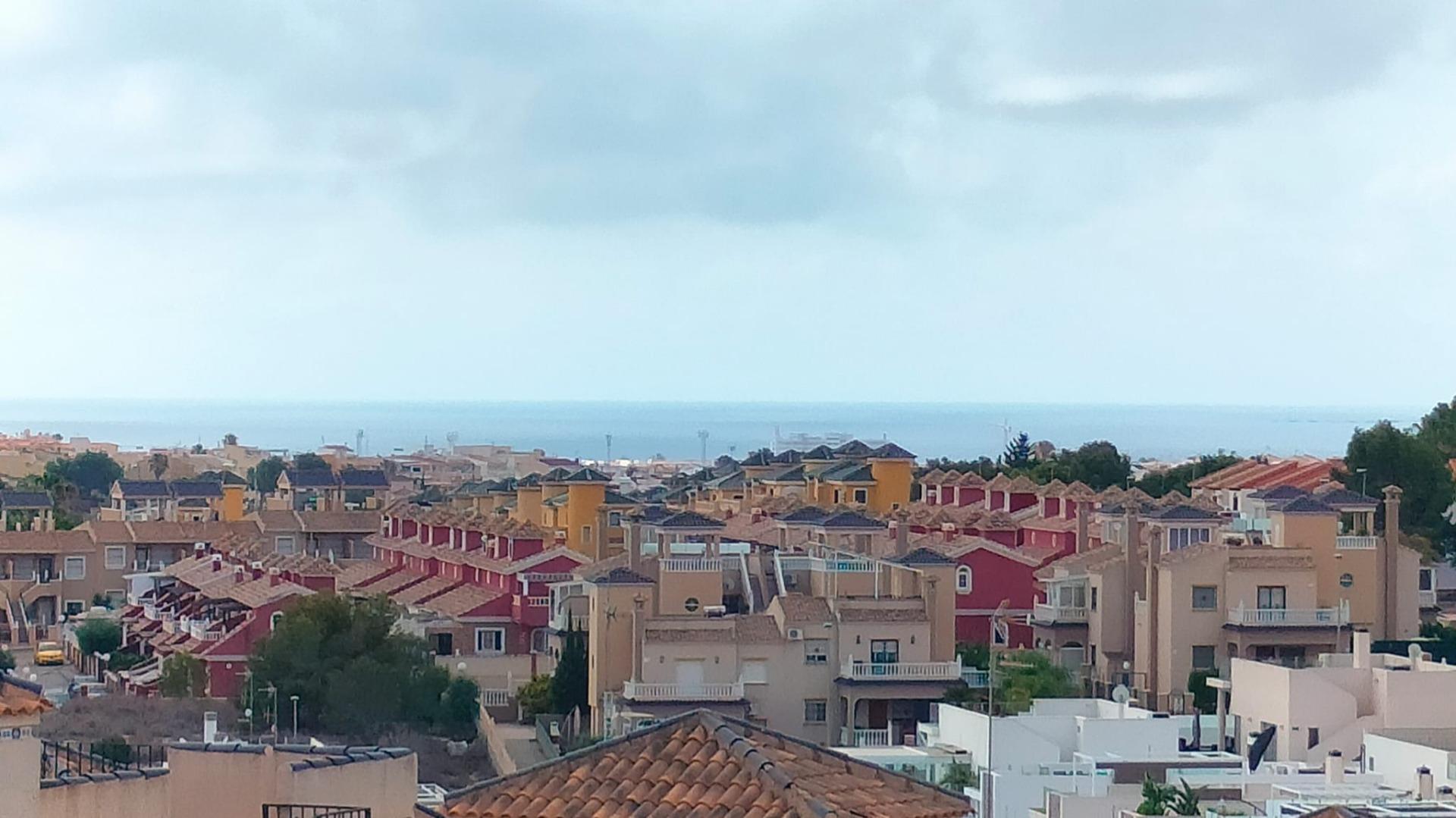 Elegant new build 3-bedroom property in Orihuela Costa with sun-drenched terraces and panoramic sea views near the beach.
