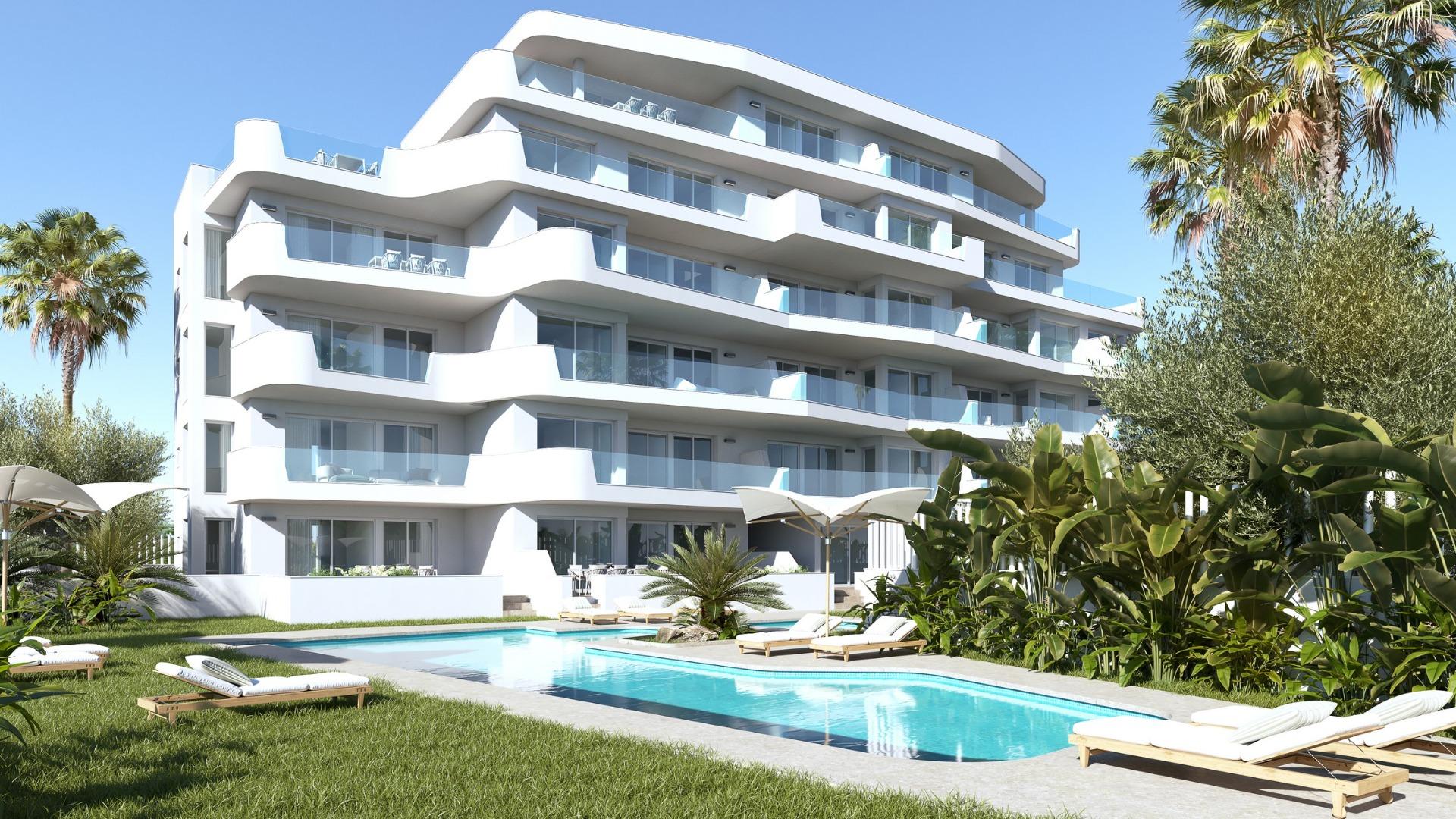 Modern sun-drenched exclusive ground floor 2-bedroom apartment in Mil Palmeras with private pool and lush landscaped garden.