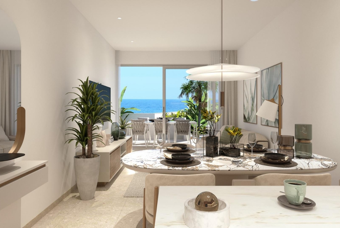 Sun-drenched, modern open-plan living and dining area in luxury 2-bedroom penthouse with panoramic sea views in Mil Palmeras.