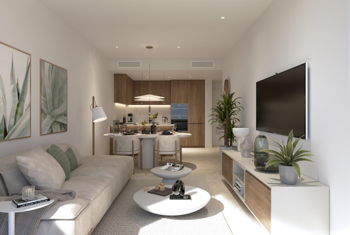Sun-drenched open-plan living and kitchen area in a modern 2-bedroom ground floor apartment in Mil Palmeras, 200m from the sea.