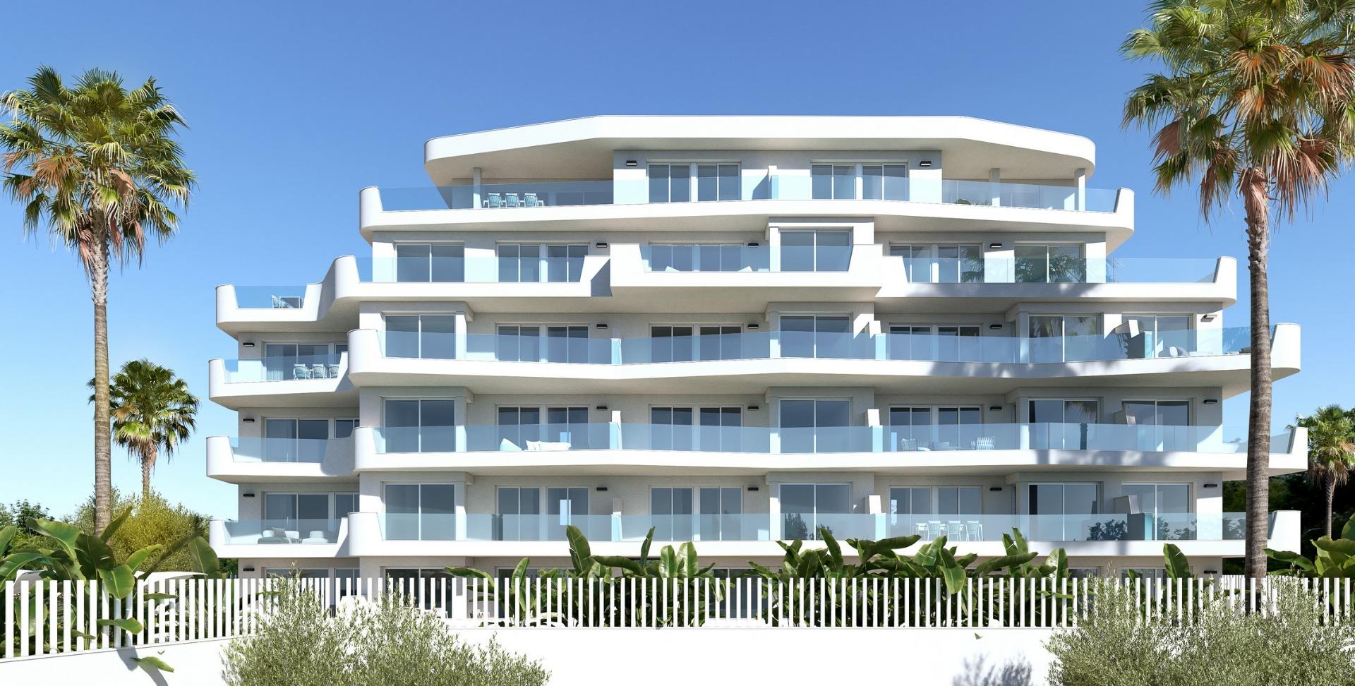 Modern luxury 2-bedroom penthouse exterior with spacious terraces and panoramic sea views in Mil Palmeras, steps from the shore.