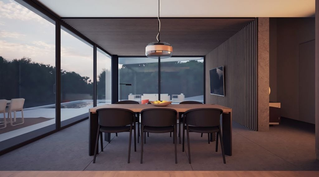 LUXURY-NEW-BUILD-VILLA-IN-ALTEA-10 Elegant modern dining area with panoramic glass walls overlooking private pool in luxury new build villa in Altea