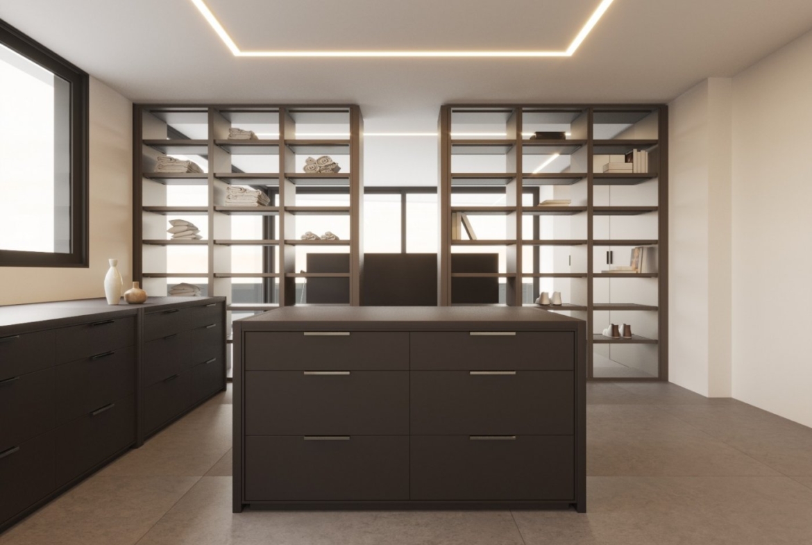 LUXURY-NEW-BUILD-VILLA-IN-ALTEA-21 Spacious modern walk-in closet with sleek dark cabinetry and glass shelving in luxury new build villa in Altea