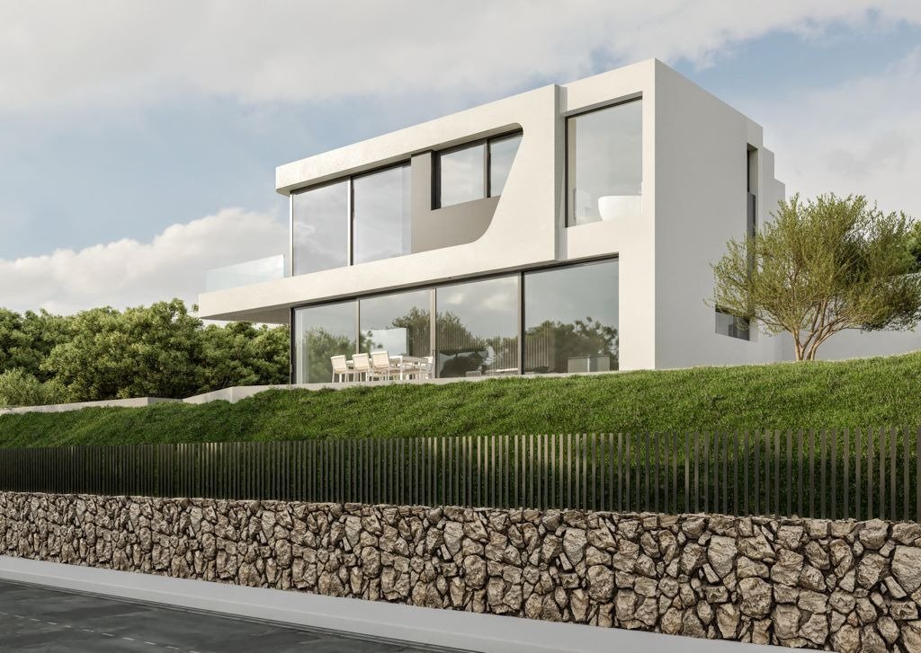 LUXURY-NEW-BUILD-VILLA-IN-ALTEA-33 Modern, minimalist luxury new build villa in Altea with expansive glass windows, terrace dining area, lush greenery, and stone wall facade.