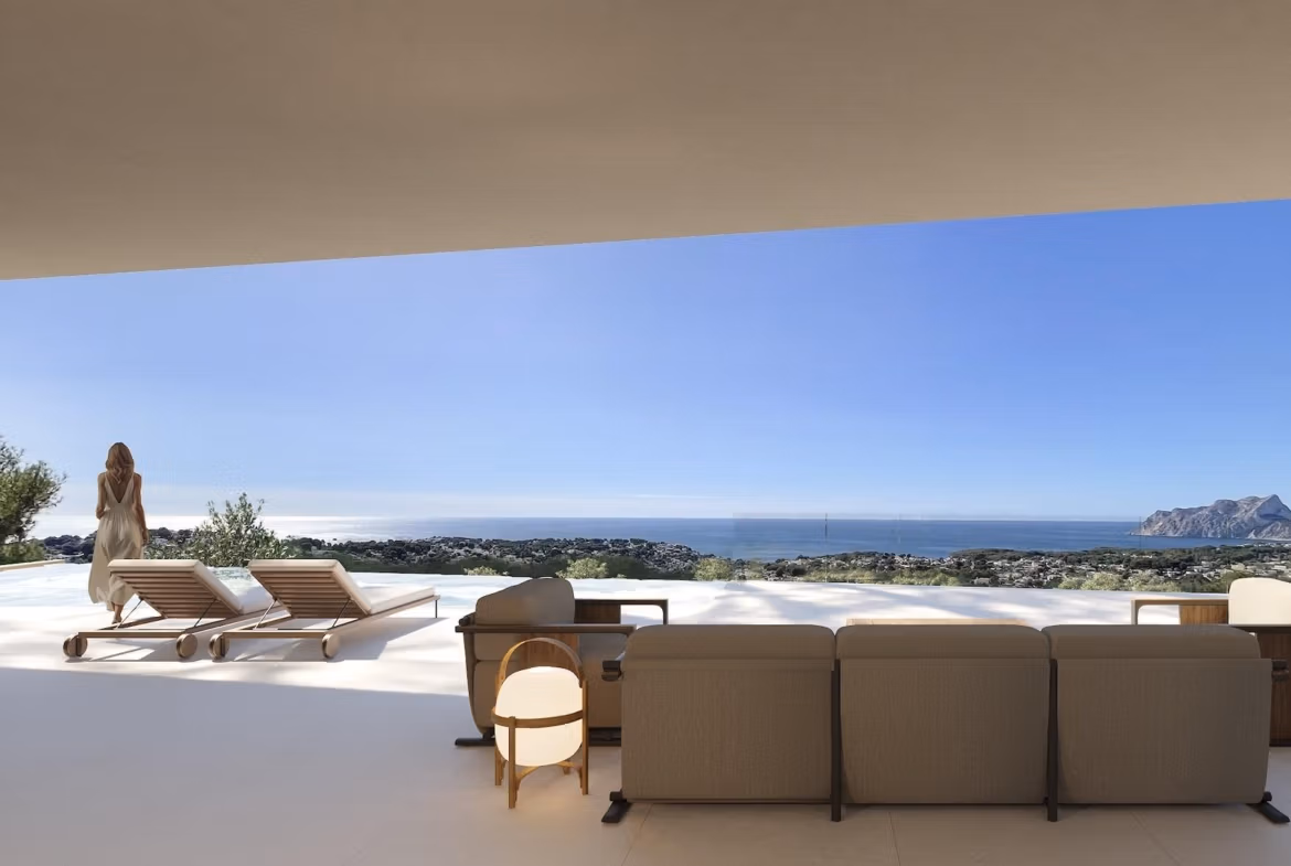 Modern architectural villa terrace в Benissa with elegant outdoor seating, sun loungers, и панорамный вид на море under a clear sky.