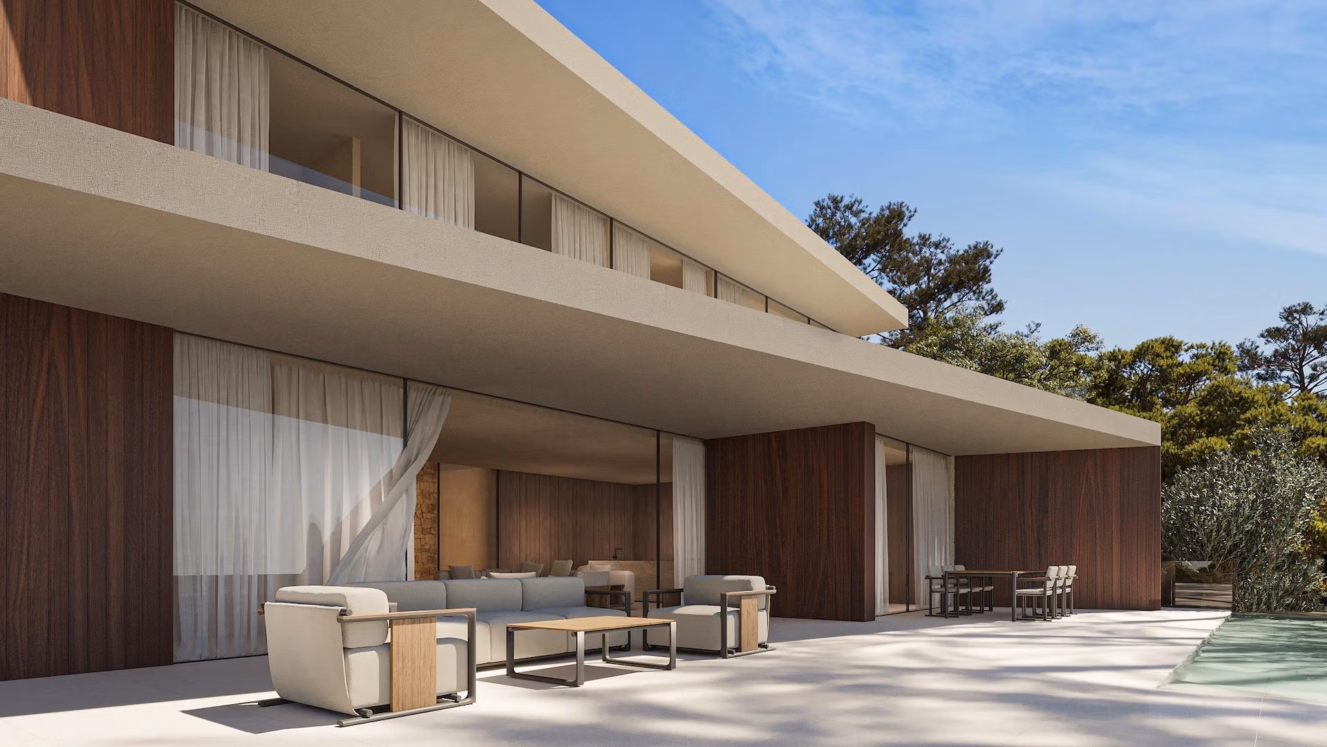 Modern architectural 4-bedroom villa exterior in Benissa showcasing spacious terraces with elegant outdoor seating and natural wood accents.