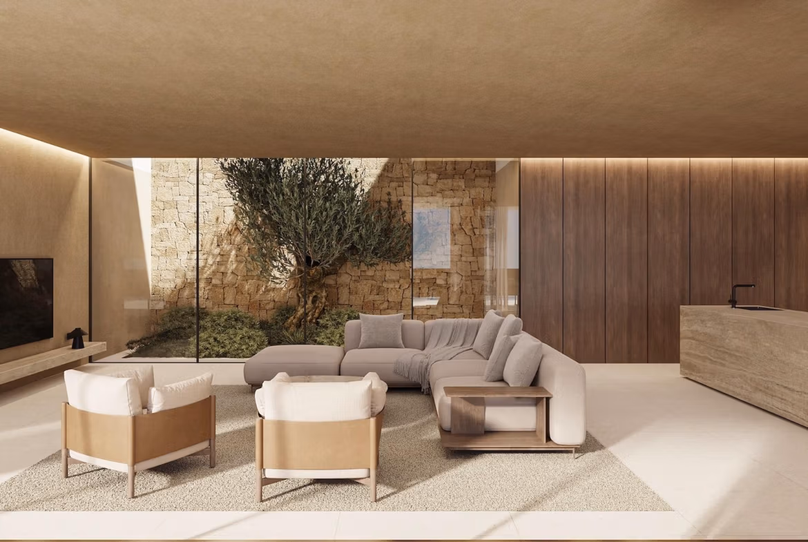 Elegant sunlit living room with modern furnishings and indoor garden in a luxury 4 bedroom villa in Benissa.