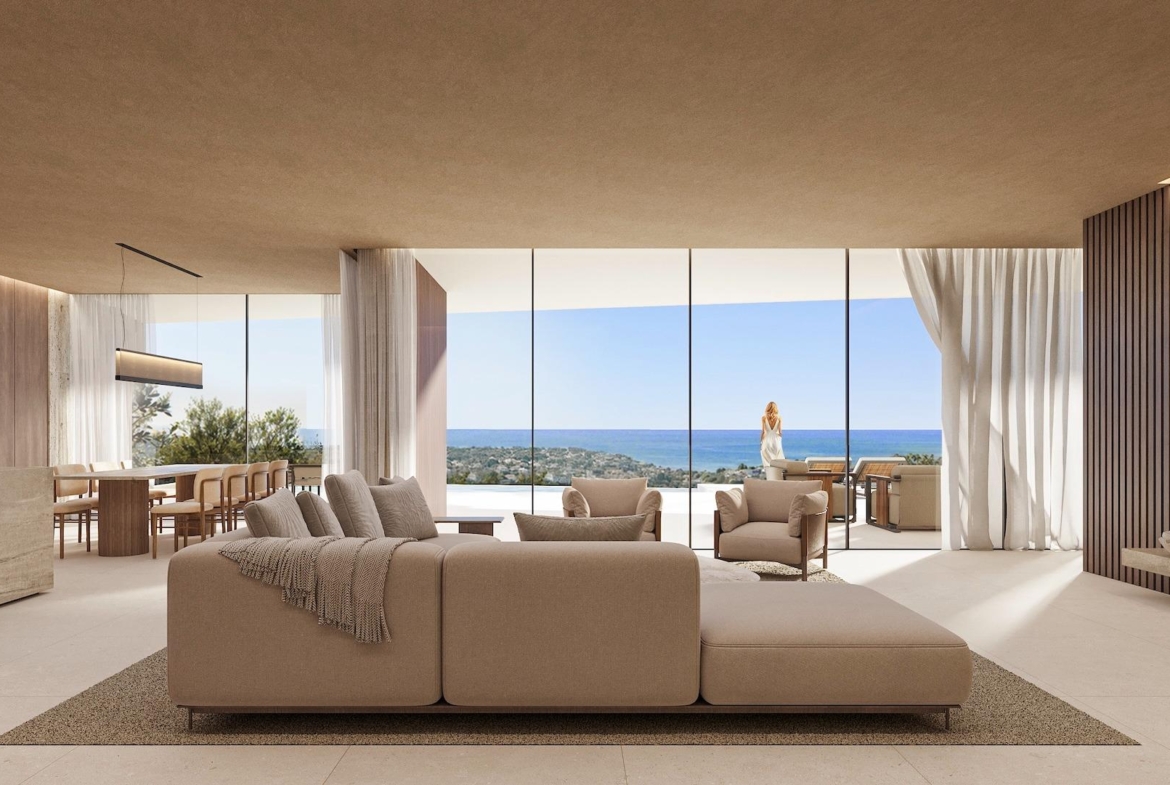Bright and spacious living area with modern furnishings and stunning panoramic sea views in luxury 4-bedroom villa, Benissa.