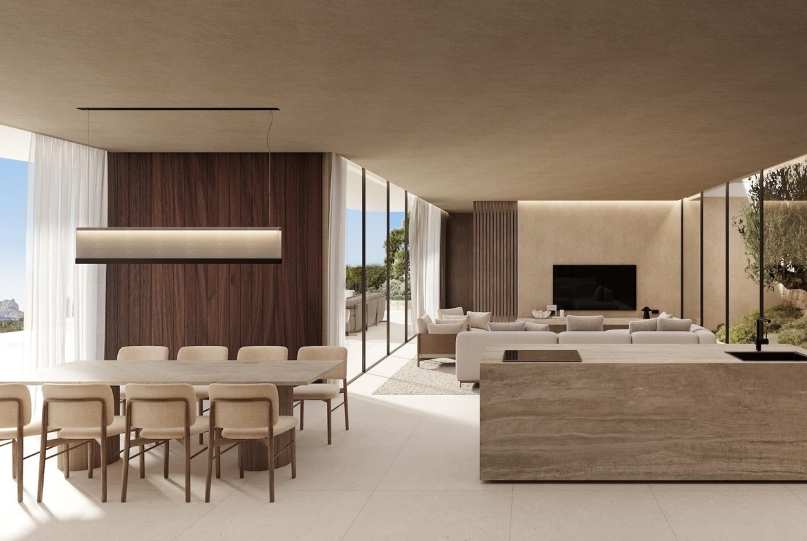 Elegant open-plan living and dining area with floor-to-ceiling windows showcasing panoramic sea views in Benissa luxury villa.