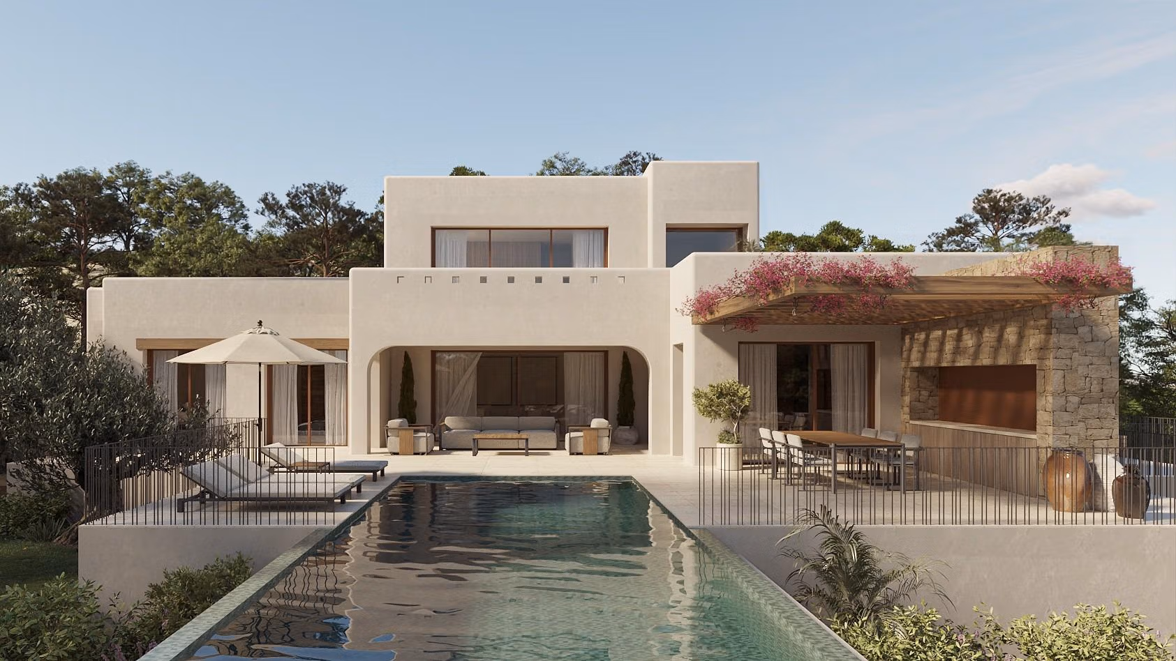 Luxury-Ibizan-Style-Villa-in-La-Fustera-Benissa-Costa-Just-1-km-from-the-Beach-1 Elegant Ibizan-style villa exterior in La Fustera, Benissa with spacious terrace, shaded dining area, and tranquil infinity pool.