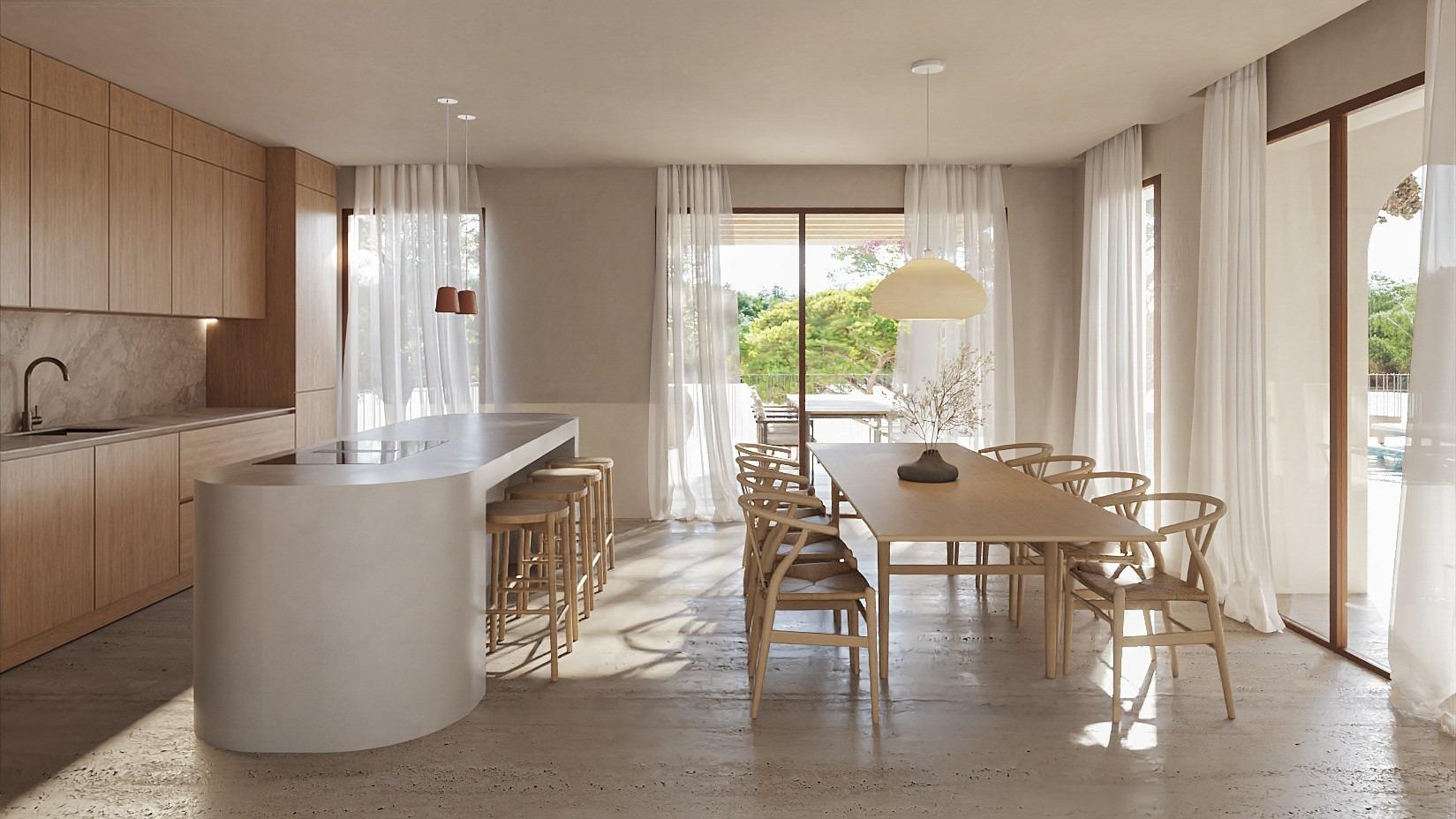 Sun-drenched open-plan kitchen and dining area with modern wood finishes in elegant Ibizan-style villa, La Fustera, Benissa