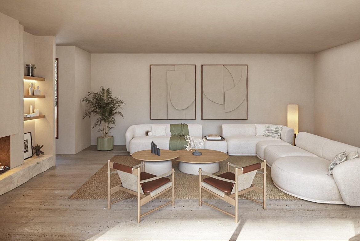 Spacious sunlit living room with modern fireplace and elegant seating in luxury Ibizan-style villa in La Fustera, Benissa