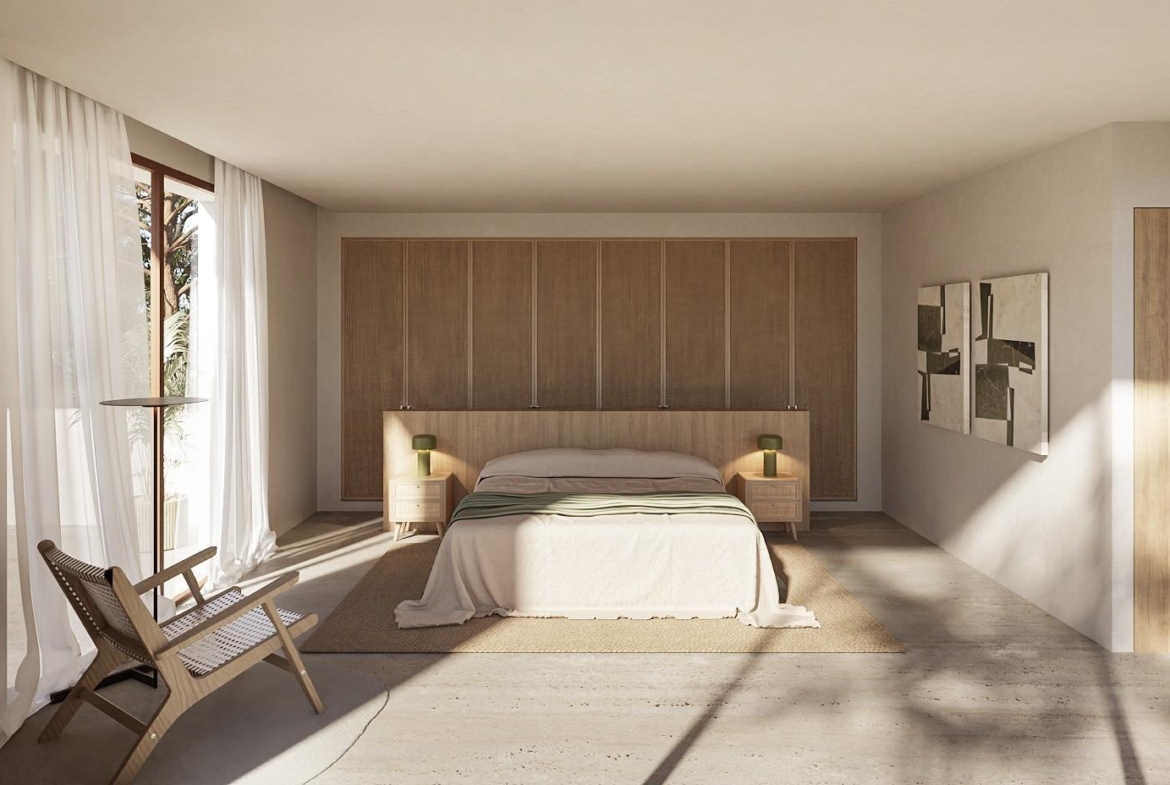 Bright, minimalist bedroom with natural light and neutral tones in elegant Ibizan-style villa in La Fustera, Benissa.